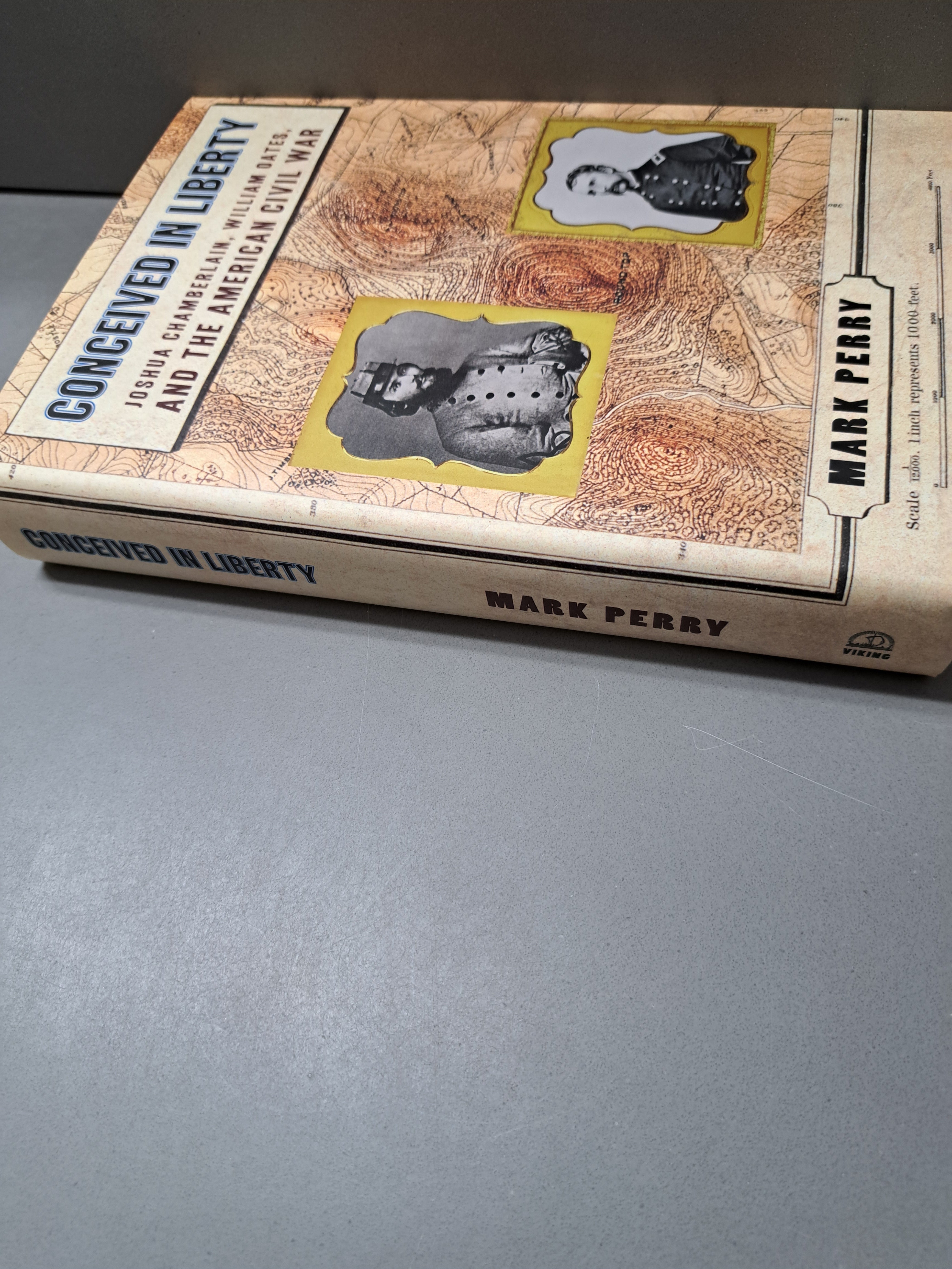 1997 first edition of Conceived in Liberty by Mark Perry