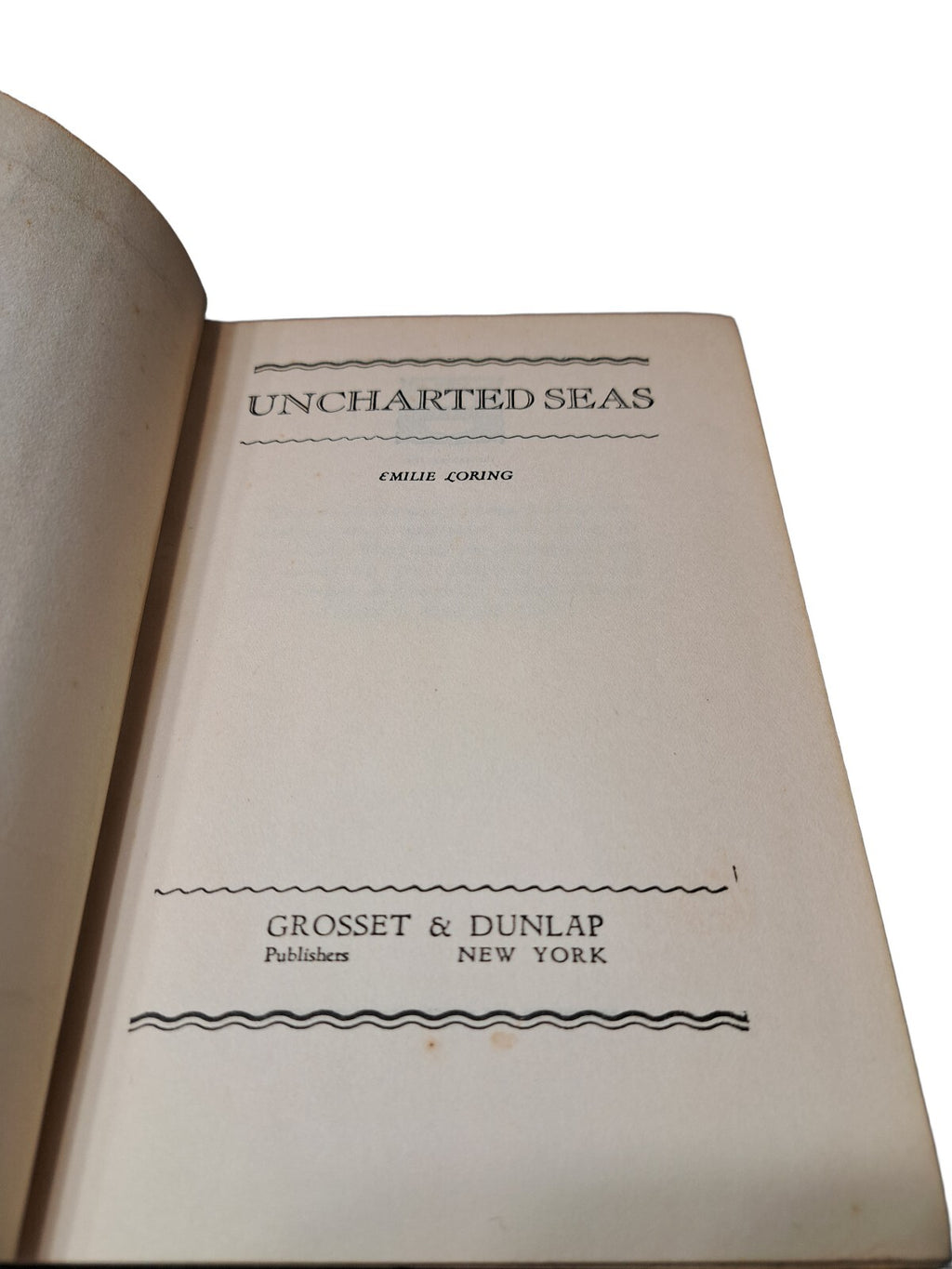 Vintage 1932 first edition of Uncharted Seas book by Emilie Loring